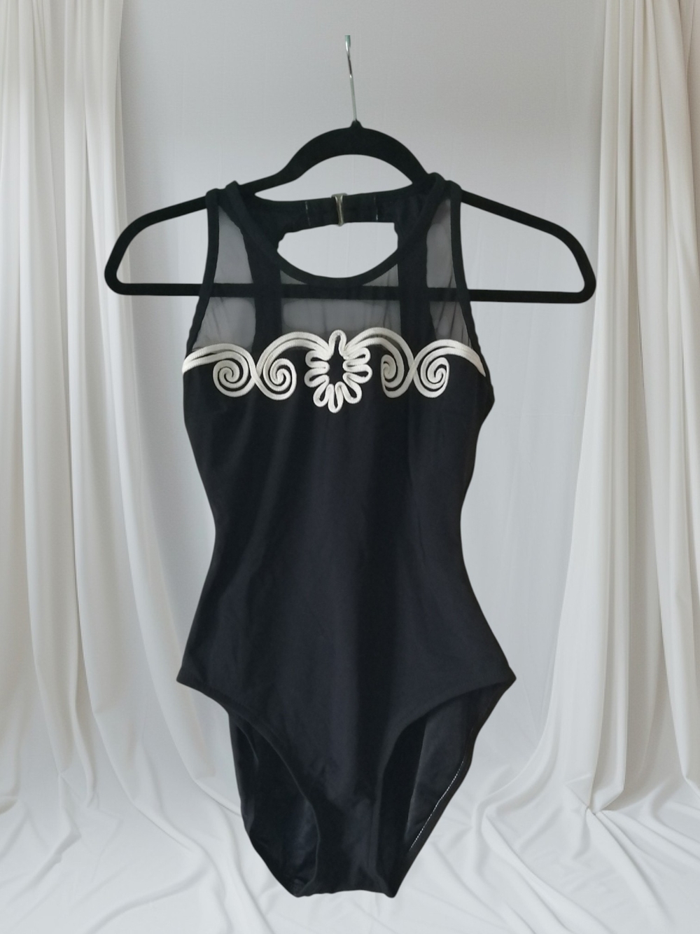 Black One-Piece Swimsuit with White Scroll Accent